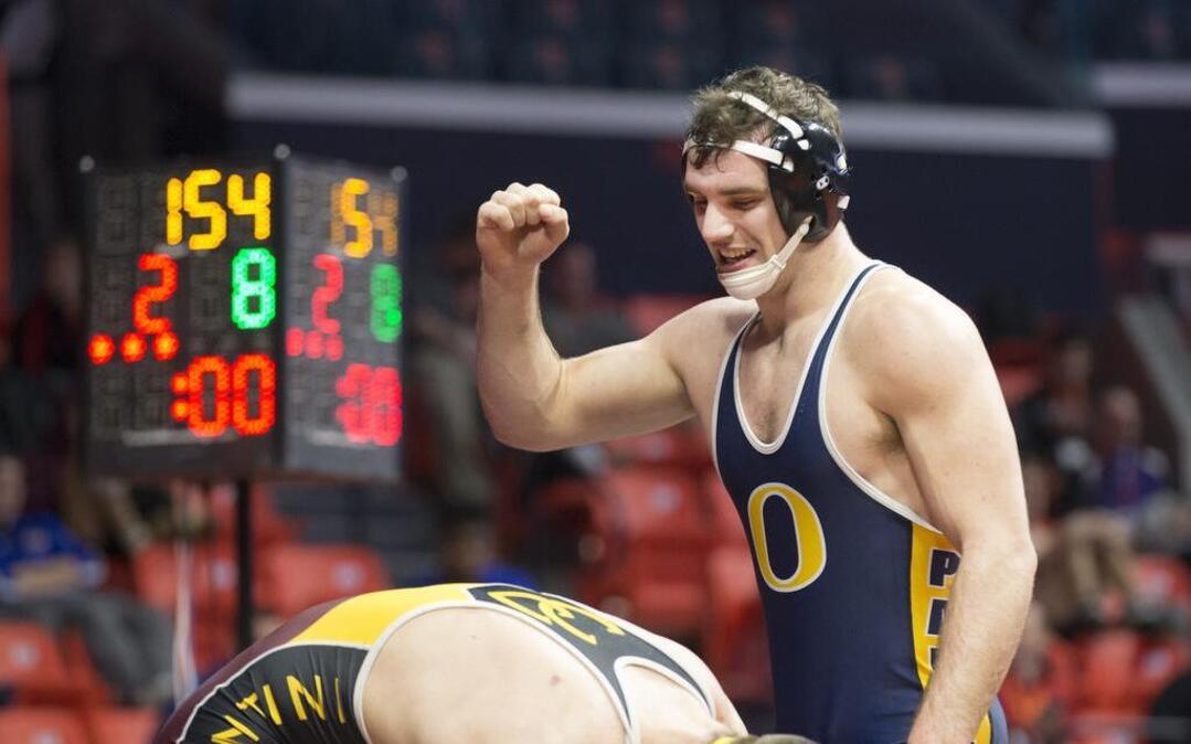O’Fallon’s Mason Hewitt celebrates after quarterfinal win over Montini’s Pete Christensen at the Illinois High School Association wrestling state tournament on Friday, Feb. 17, 2017, in Champaign.