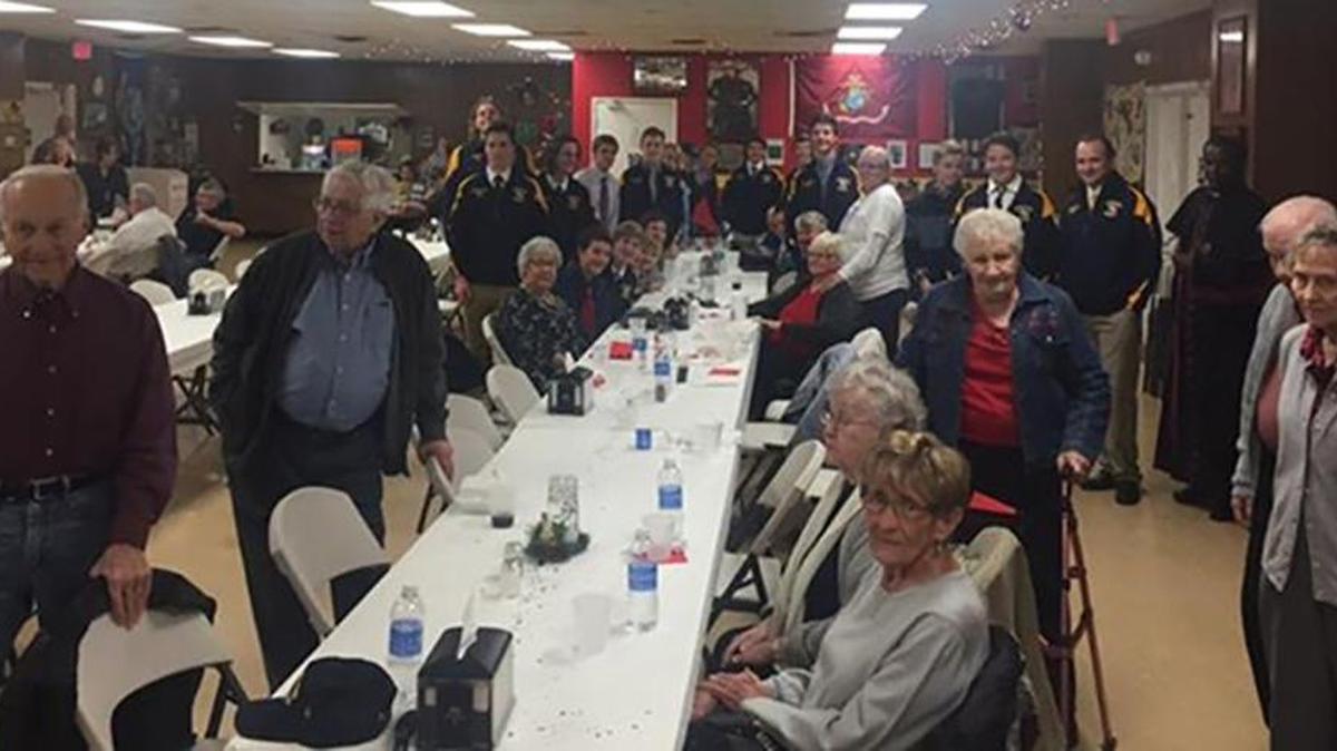 On Dec. 8, the Comrades and Auxiliary of Sgt Charles A Fricke VFW Post 805 of O’Fallon hosted a holiday dinner for veterans and their spouses who live in local nursing and assisted living homes. These dinners have been a huge hit with everyone who has been involved with them in the past and this time was no different. The conversations between the hosts and attendees and the time spent together are priceless. This year’s attendance numbered over 70 people. The O’Fallon Hockey Club helped serve the seniors and enjoyed talking with them as well. Thanks to those from the Post who were able to help, and those that were able to attend: Fountains of Shiloh, Cedarhurst of Shiloh, Cedars of Lebanon, O’Fallon Senior Apartments, O’Fallon Hockey Club (O’Fallon High School varsity and JV players and their families). A special thanks to The Happy Bakery in O’Fallon for their generous donation of some amazing desserts. Thanks also to Archbishop Hartley of Good Shepard in Belleville for attending and saying the prayer. Happy Holidays and New Year to everyone.