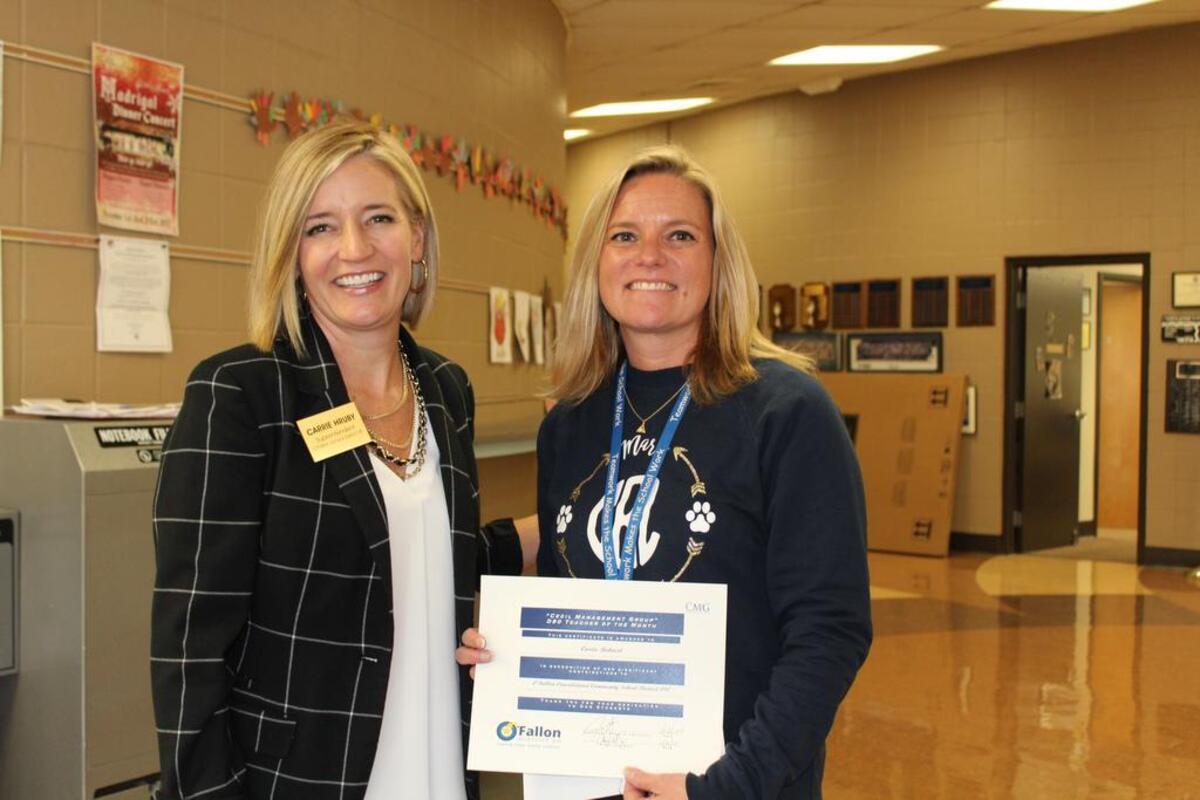 From left, O’Fallon School District 90 Superintendent Carrie Hruby presented Marie Schaefer Elementary Teacher Carrie Bohnert with a certificate honoring her as the November Teacher of the Month.
