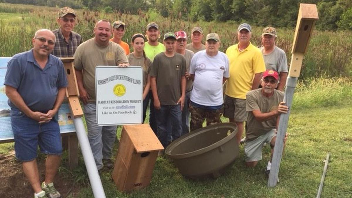 Left, Shiloh Mayor Jim Vernier stands with The Mississippi Valley Duck Hunter’s Association (MVDH) members who installed new waterfowl nesting structures; one geese, two for wood ducks, and two for blue birds on Sept. 14 at Shiloh’s Three Springs Park Wetlands for a habitat restoration project, 2250 West Frank Scott Pkwy. The MVDH has been installing wood duck houses since the 1970s, and goose nesting structures, which are commercially made, since 1999. The wood duck and blue bird houses are made by members of MVDH. Many can find our the MVDH nesting structures on Carlyle Lake, Baldwin Lake and Wildlife area, Pyramid State Park, Sparta Shooting Complex, New Athens Pit Three Conservation Area and local cities lakes and containment areas. MVDH also donate nesting structures to Ducks Unlimited and Delta Waterfowl for their fund raising dinners along with other wild life organizations. So people can find MVDH structures on numerous private farm ponds as well. The nesting boxes make it convenient for the waterfowl, and in the case of the goose nests predator free. The bird houses are for blue birds and house wrens both are song birds, which their songs are enjoyed by the community.