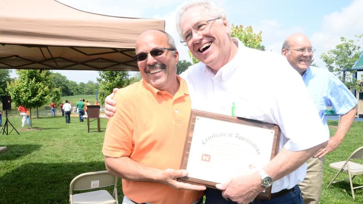 Shiloh Mayor Jim Vernier and former village engineer Norm Etling were all smiles last year during a ribbon cutting ceremony at Three Springs Park.