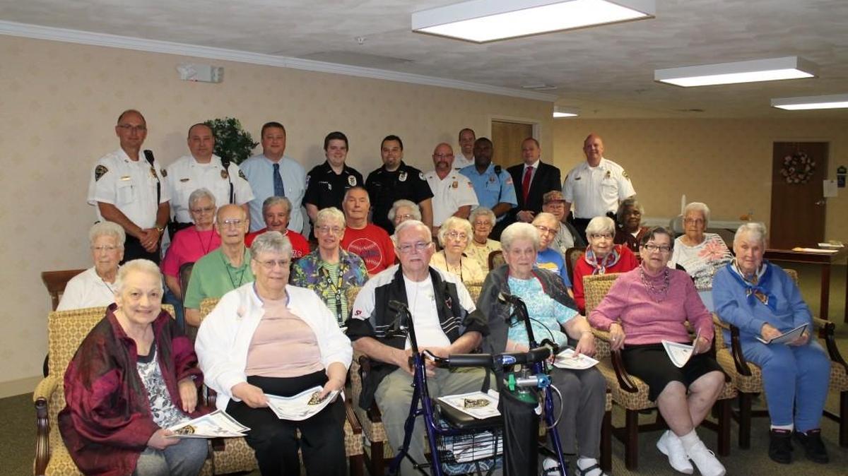 Back row from left, O’Fallon Police Lt. Jim Cavins, Lt. Kerry Andrews, Daryl Ostendorf, Emergency Meditcal Technician (EMT) Justin Verner, EMT Rickey Palmer, Fire Chief Brent Saunders, John Bagnarelli, Mary Bagnarelli, Mary Ellen Battoe, Sandy Cedarleaf, John Chapas, Lois Corbit, Larry Dedmon, Barb Emanuelson, Phill Goscinski, Edith Hock, Linda Huwer, Ruth Kraft, Alan Neely, Richard Perry, Nina Pfeifer, Curtis Pool, Jackie Skinner, Leona Srnka, Louisa Wagner, Marie Wagoner, Mary Wiegel, Millie Wilson, and Lorraine Wright.