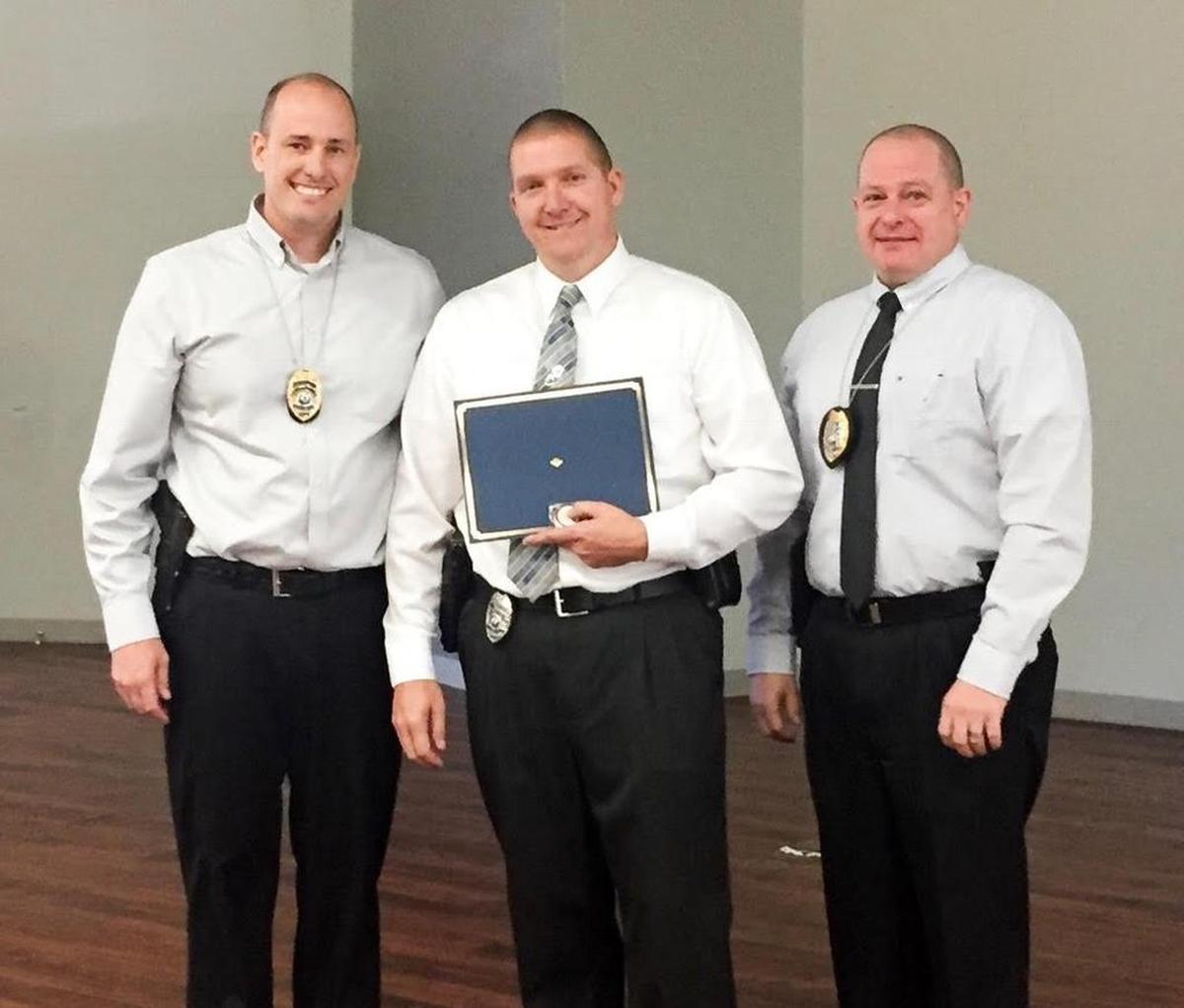 O’Fallon Department of Public Safety 2017 Employee of the Year awards were given during the Thursday, Dec. 7 annual awards event. From left, Captain Kirk Brueggeman, Detective Brian Gimpel and Chief Eric Van Hook.