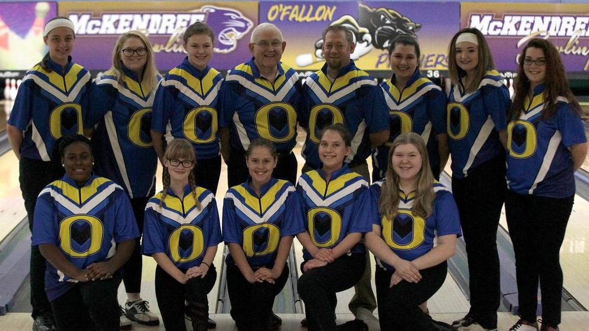 The O’Fallon Township girls bowling team includes, front row from left, Terielle Glasper, Elly Gordon, Isabelle Bassford, Claire Crook, Lauren Tomaszewski; back row, Mary Orf, Natalie Heltne, Hanna Kester, coach Rich Williams, coach Garrett Spencer, Grace Braswell, Madison Thornton, Hayleigh Williams.