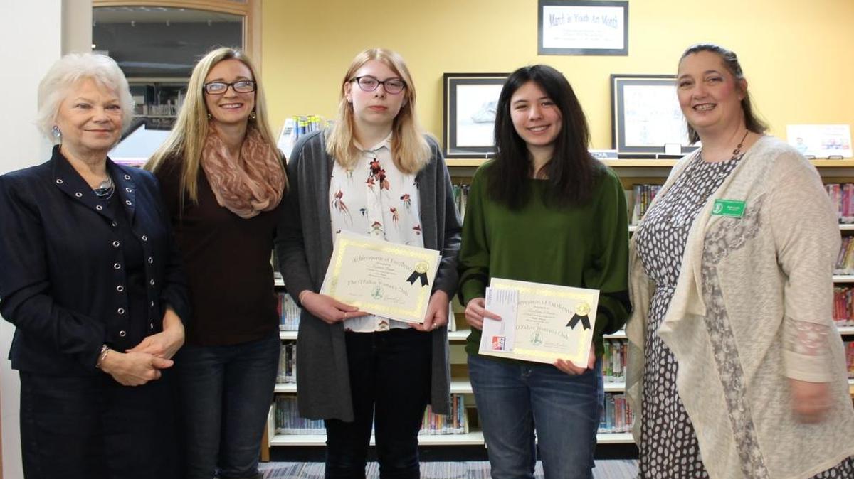 From left are Sarah Jane Siegler, art contest co-chair; Amy Thompson, art contest co-chair; Kirsten Pappe, first-place winner; LeAnn Schmitt, second-place winner; and Beth Lundy, O’Fallon Women’s Club president.