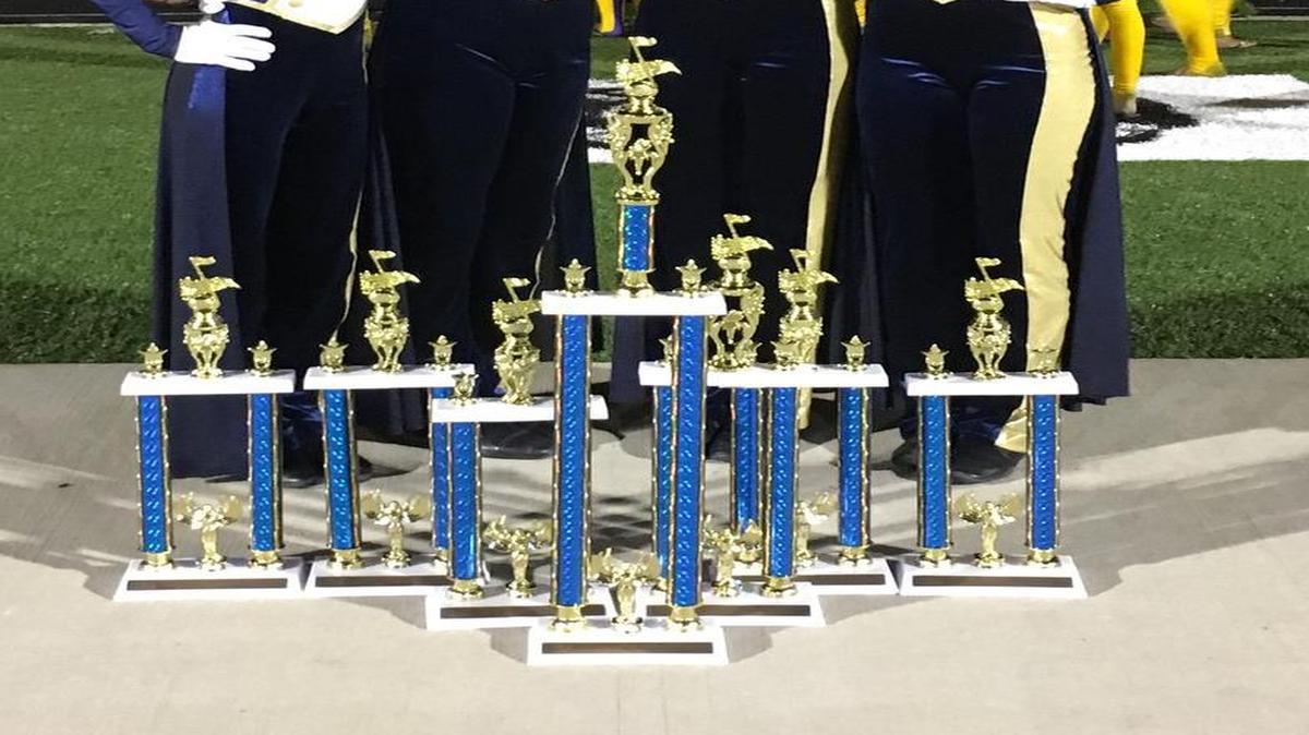 The Marching Panthers won first place in the Class 4A competition on Saturday night at the Belleville East Marching Invitational.
