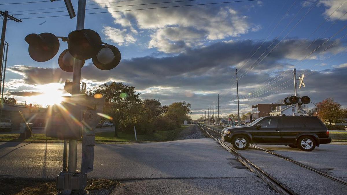 A SUV crosses the railroad tracks at S. Cherry Street in O’Fallon. Last year, CSX got approval from the Surface Transportation Board to discontinue service along 23.9 miles running through O’Fallon.