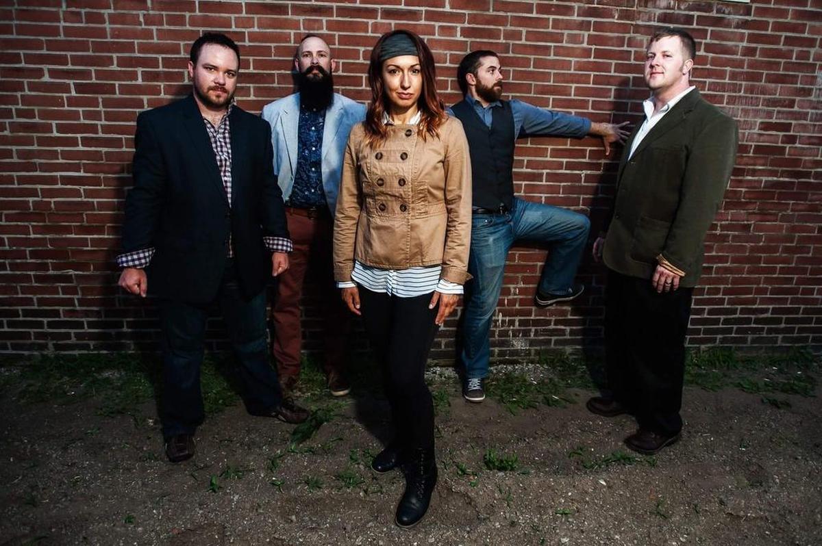 Courtney King with her band, “Slow Down Scarlett.”