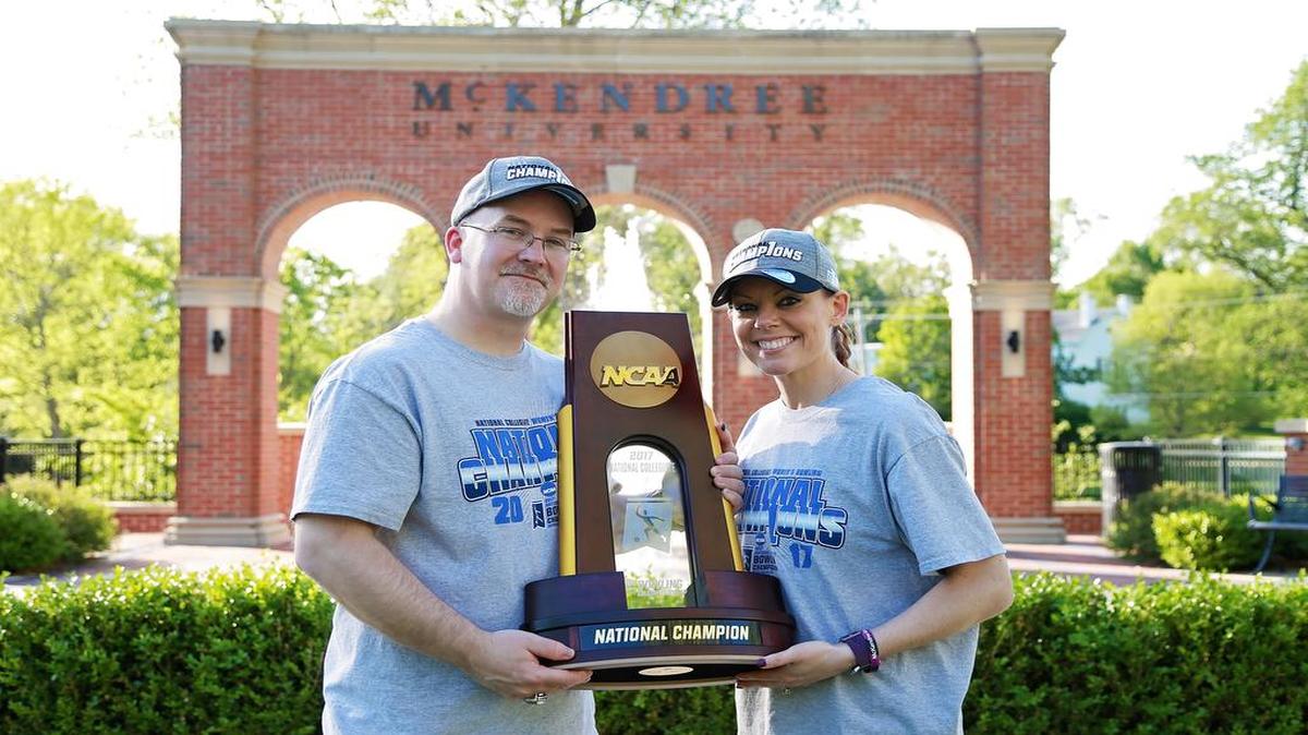 Shannon and Bryan O’Keefe pose with McKendree University NCAA bowling championship trophy.