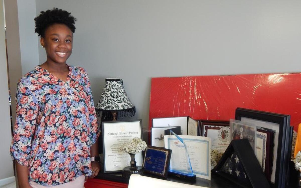 Jasmyn Harris with some of her awards.