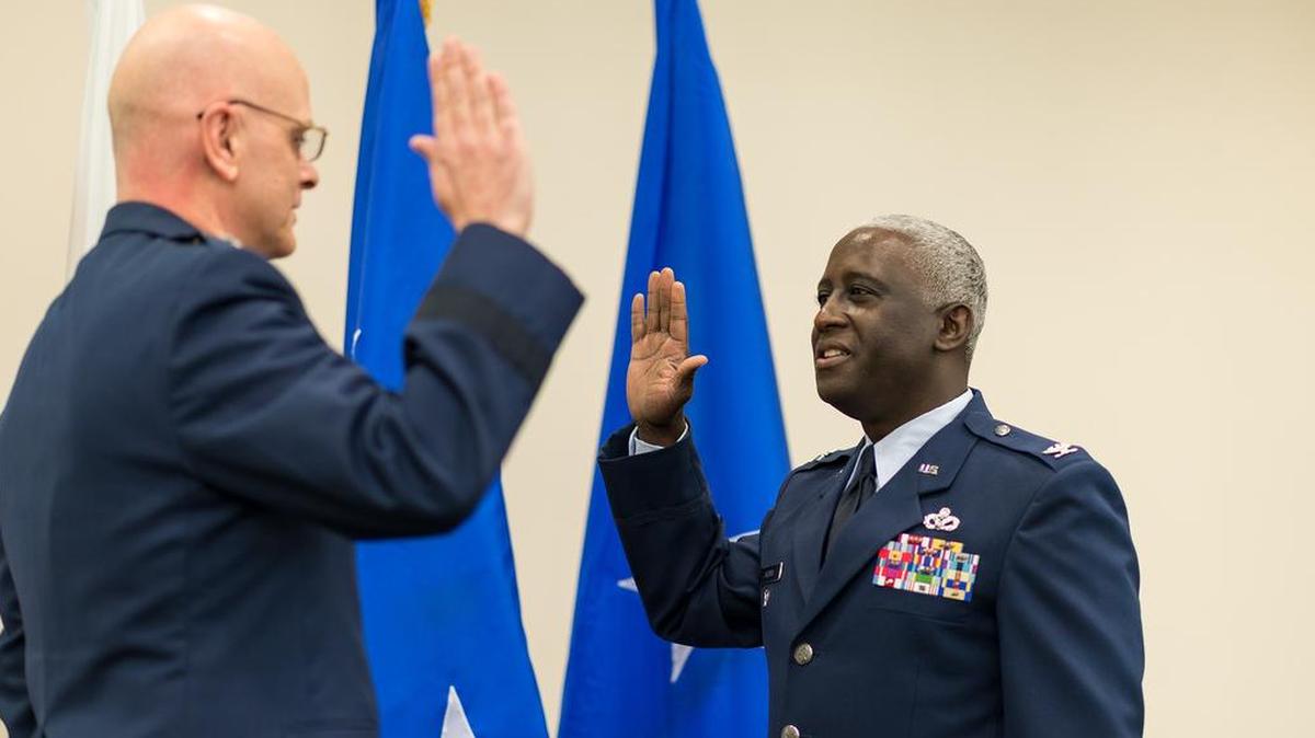Col. Kevin Jacobs, of O’Fallon recites the oath of office to Maj. Gen. Ron Paul during a promotion ceremony at the 183rd Air Wing, Springfield Jan. 25. Jacobs serves as the director of Staff-Air for the Illinois National Guard.