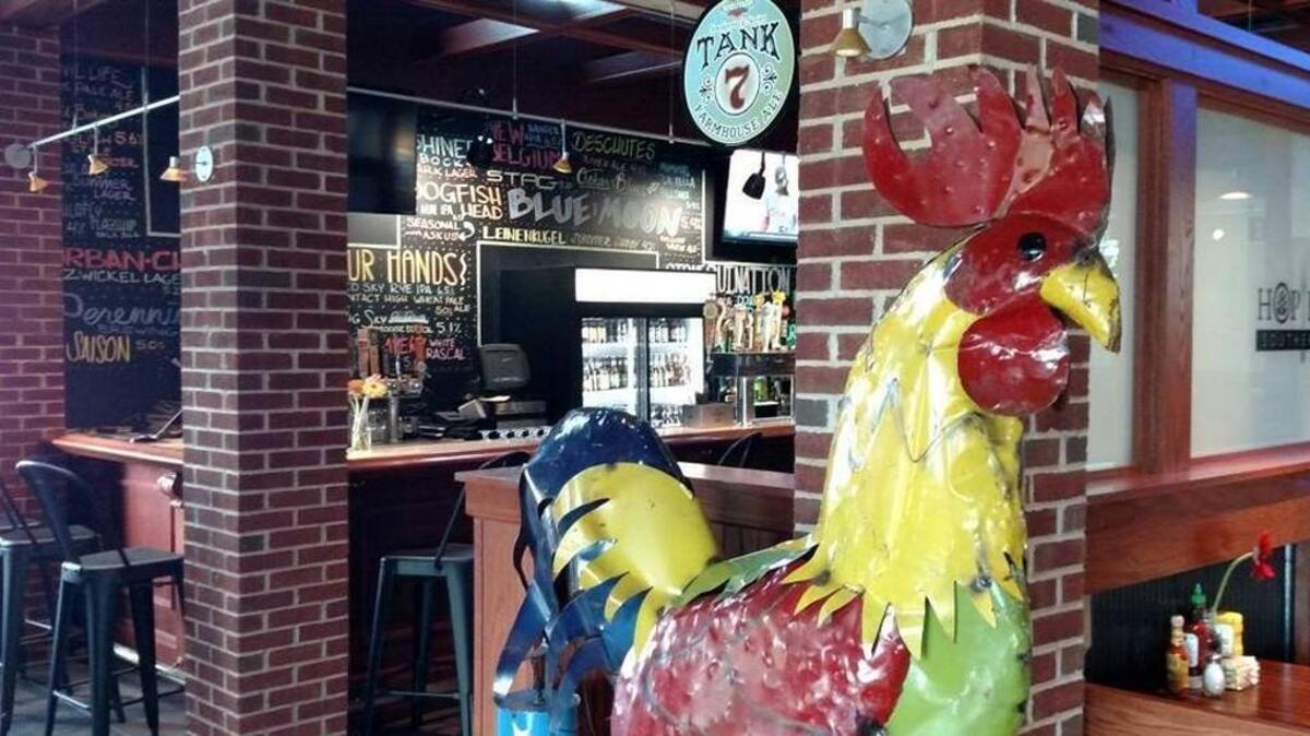 Just steps inside the Hop House Southern Eatery in O’Fallon stands this six-foot tall chicken. It’s one of many unique decorations inside.