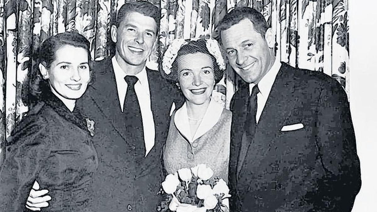 Matron of honor Brenda Marshall (left) and best man William Holden were sole guests at Ronald and Nancy Reagan’s wedding in 1952.