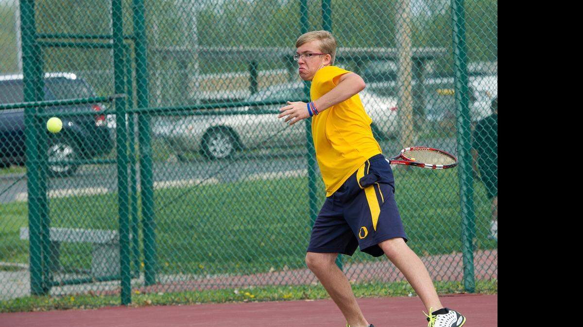
O’Fallon tennis standout Ryan Muren gets ready to return a shot during Saturday’s quadrangular meet at O’Fallon.
