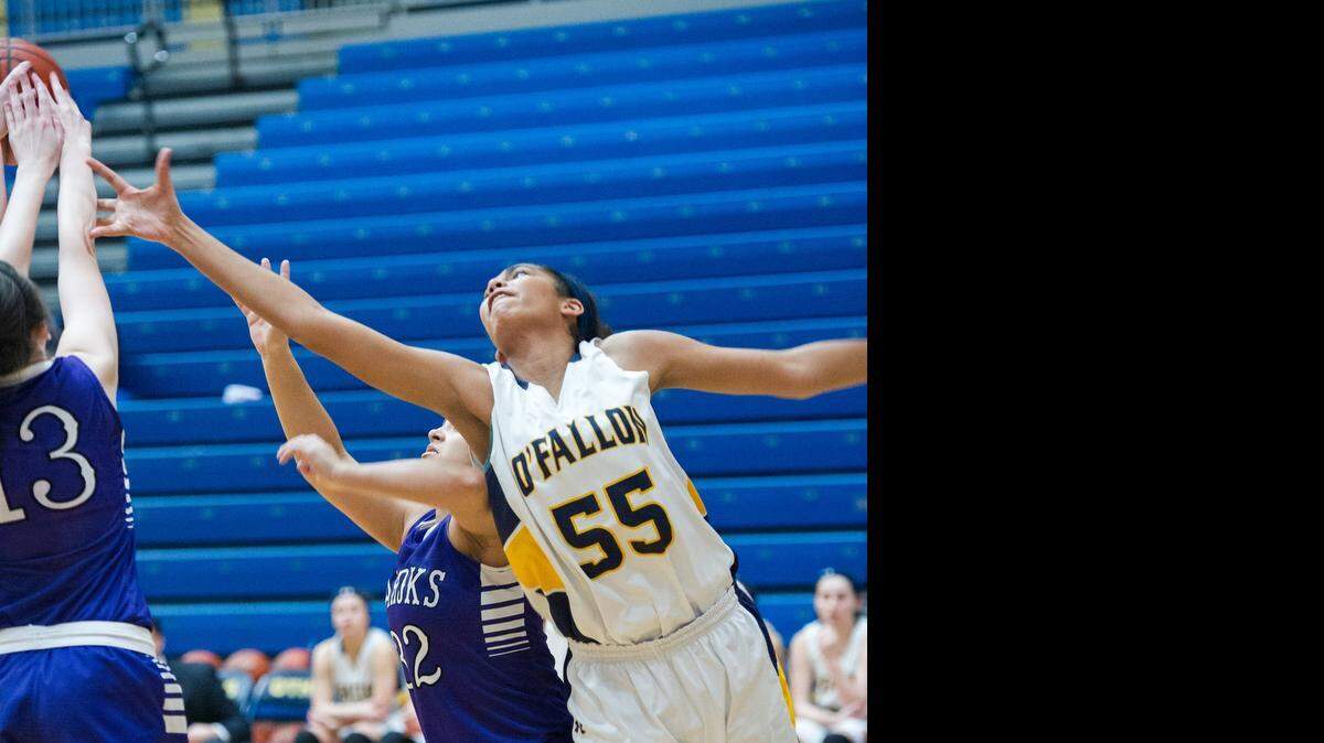 
O’Fallon standout Celeste Akoro battles an opponent during a game this winter.
