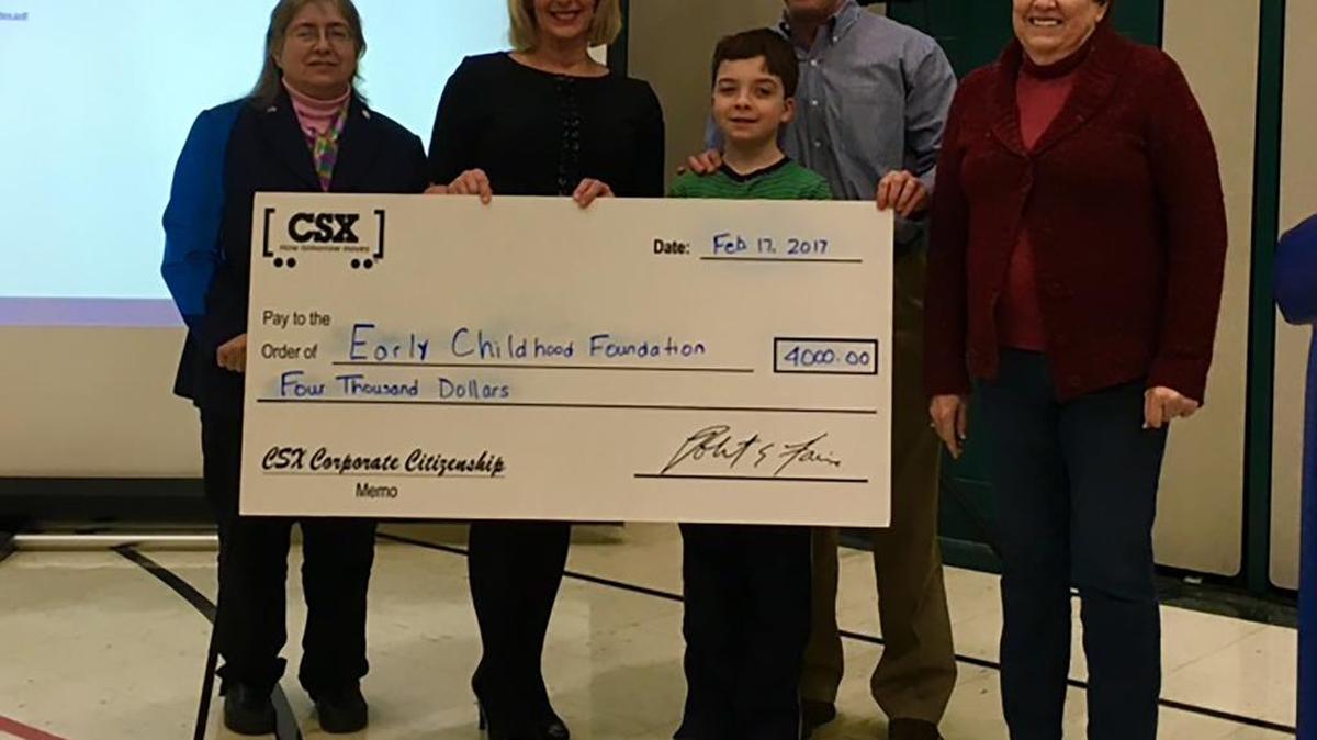 Lex White of CSX Corporation presented the Early Childhood Development Foundation NFP of O’Fallon with a $4,000 check representing a 2016 grant award at the O’Fallon District 90 School Board meeting on Jan. 17. CSX has been an ongoing major supporter of the foundation, which gives scholarships to preschoolers in order to benefit from a quality education. Pictured from left are Dr Cindy Doil, ECD Foundation member; Debbie Yaeger, ECD Foundation president; Lex White Jr. and Lex White; and Mary Basket, ECD Foundation member.