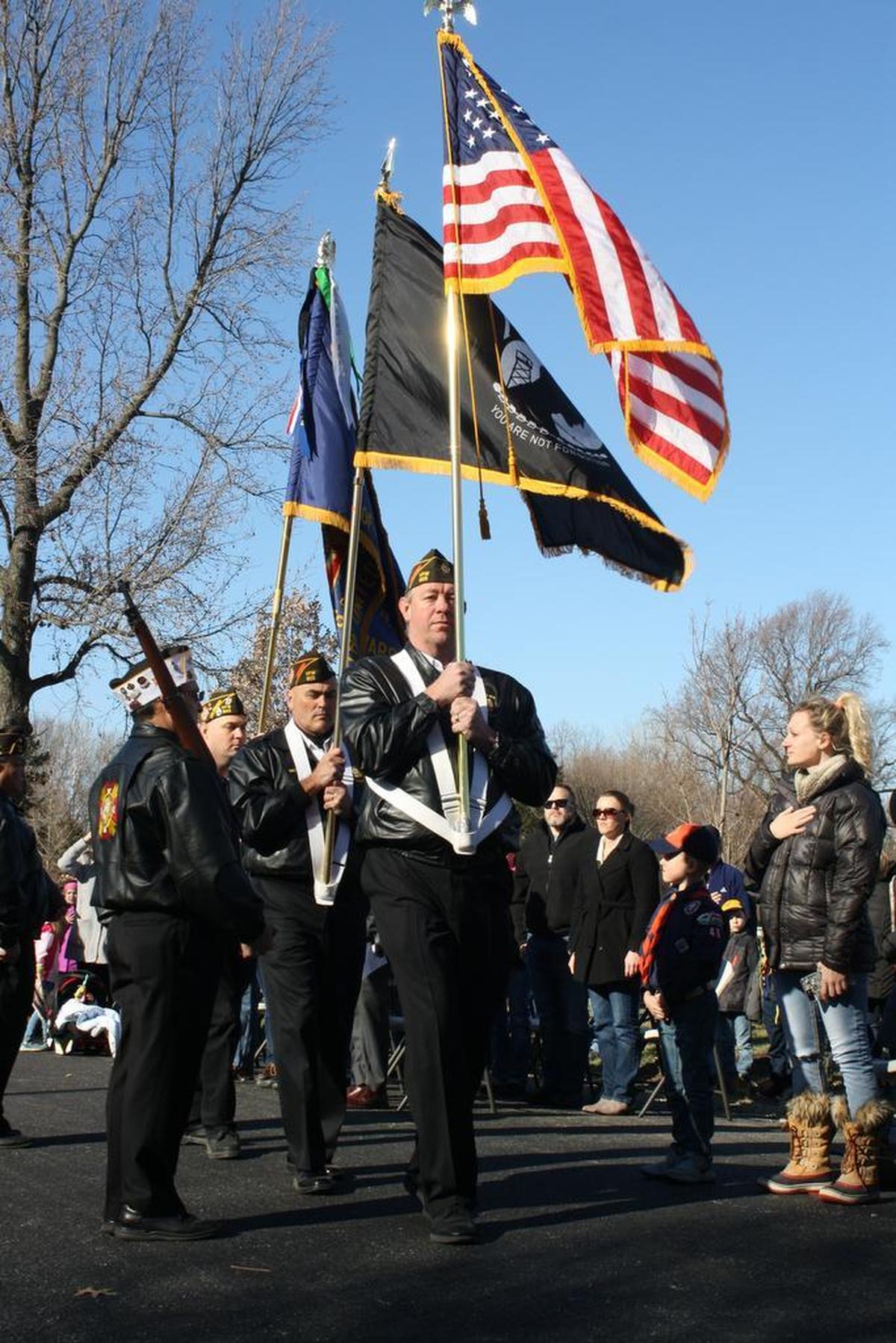 O’Fallon Post 805 Veterans of Foreign Wars members open the O’Fallon Cemetery Wreaths Across America ceremony Saturday, Dec. 16 with the posting of the colors.