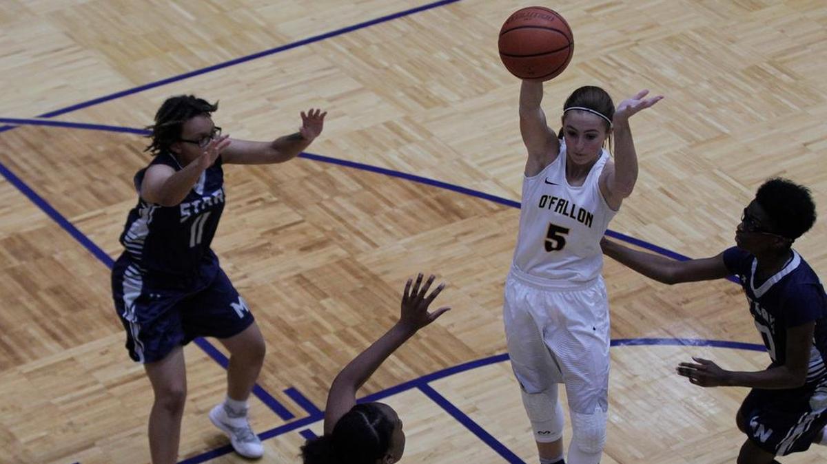 Courtney Keller jumps to deliver a pass in O’Fallon’s 65-26 victory on Wednesday, Nov. 22 against McCluer North High School in the O’Fallon Tipoff Classic.