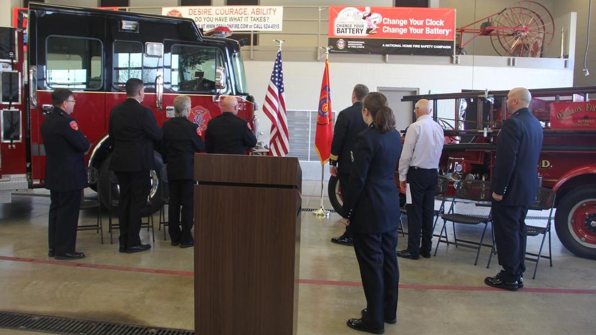 O’Fallon Mayor Gary Graham joins O’Fallon firefighters Saturday at the department’s 125th anniversary celebration.