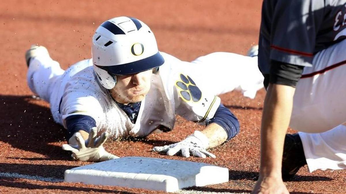 O'Fallon's Cody Crowder slides safely into third against Edwardsville.
