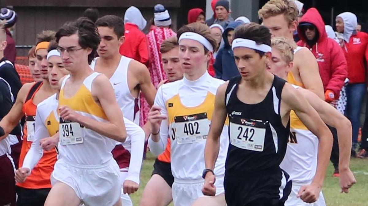 OTHS cross country runners, all in white, Hayden Ybarra (in white headband), Lucas Capistrant (394), Will VanAlstine (402), Matthew Gilster, Garrett Blenkush (in back) run in the Granite City Sectional.