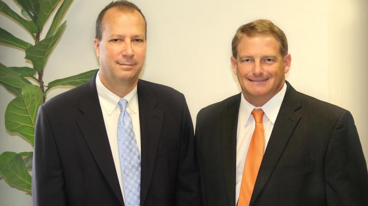 Dave Kunkel (left) and Terry Lammers (right) recently purchased Cecil Management Group, Inc. and Matt Cecil, Dorcas Cecil’s son. Since the purchase, the office has been moved to a larger facility at 784 Wall Street in O’Fallon, adjacent to Innovative Business Advisors and Kunkel Commercial Group for ease of day-to- day operations.