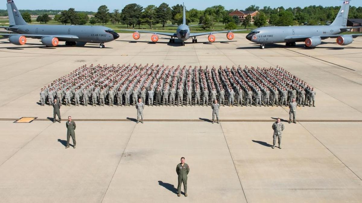 Members of the 126th Air Refueling Wing gathered on the National Guard parking ramp at Scott Air Force Base, Illinois, May 7, 2017, for a wing photo. Pictured in the front three rows, left to right, front to back, are Col. Peter Nezamis, commander; Col. Jeffrey Jacobson, vice commander; Chief Master Sgt. Michael Douglas, command chief; Col. Tom Jackson, commander of the 126th Operations Group; Col. Joshua Hendrix, commander of the 126th Maintenance Group; Col. Johnathan Boehning, commander of the 126th Mission Support Group; and Lt. Col. Dennis Els, commander of the 126th Medical Group.