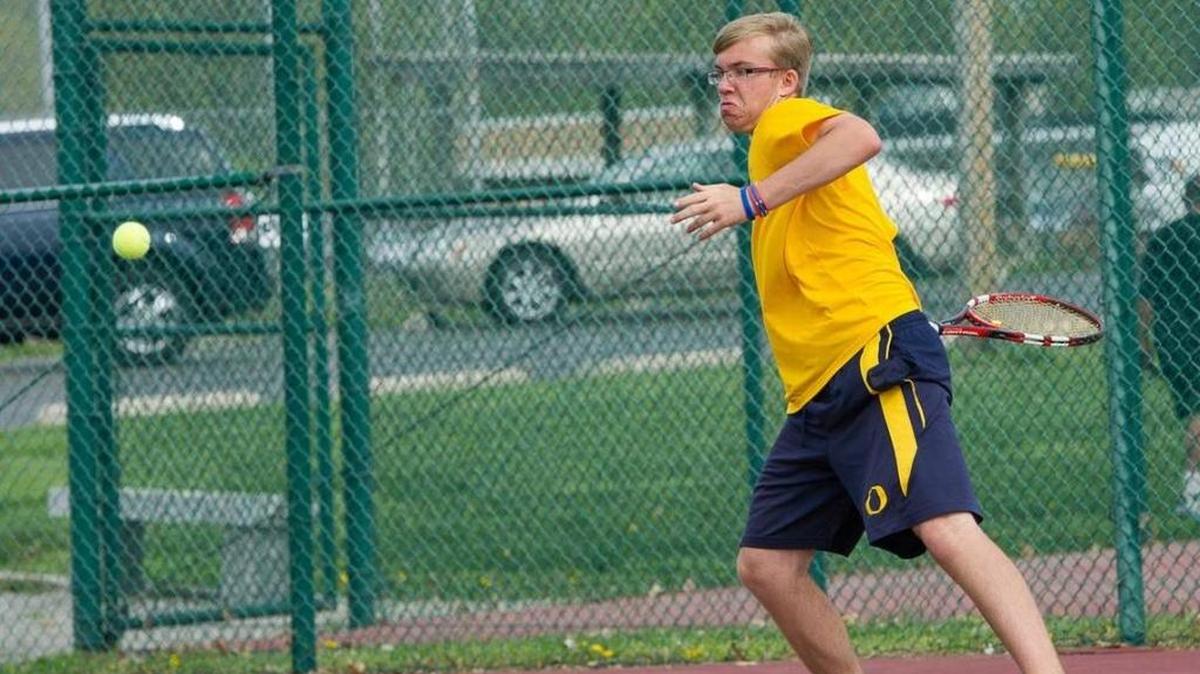 O’Fallon tennis standout Ryan Muren gets ready to return a shot during a recent practice at O’Fallon Township High School.