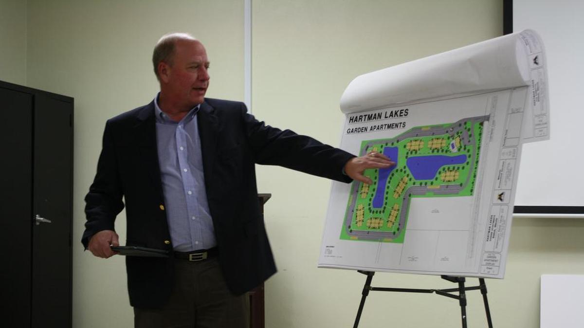 Presenting new information regarding the scope of the Hartman Lakes residential development is Eric Olson, civil engineer with Millenia Professional Services representing the developer Greenmount Retail Center LLC., during the second half of the public hearing Monday, Nov. 13 at the Shiloh Senior Center.