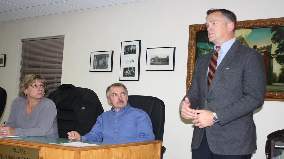 Dierbergs Markets Inc. representative Brent Beumer, vice president of Real Estate & Corporate Counsel, (left) speaks to the Village of Shiloh Board of Trustees during the Monday, Nov. 28 public hearing. From right, Trustees Tina Warchol and Bob Weilmuenster.