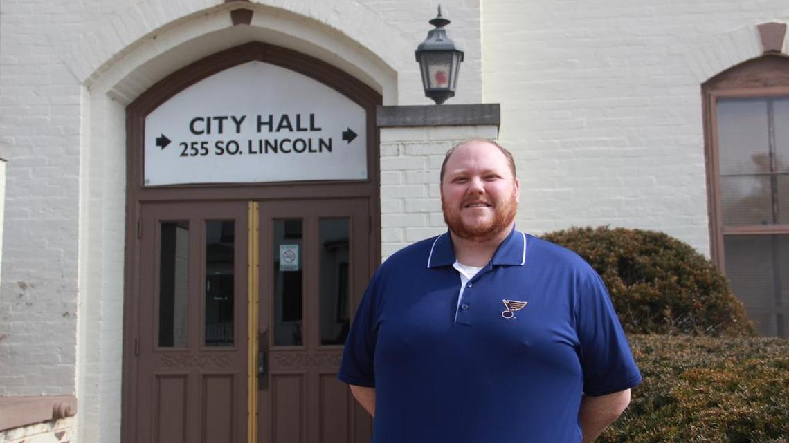 O’Fallon City Planner Justin Randall stands in front of old city hall, recently. The City Council has agreed to sell the 116-year-old building to Brad McMillin for $10,000