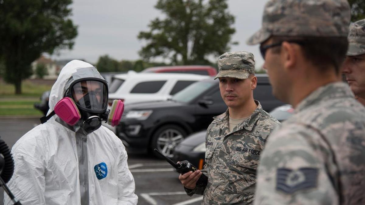 Members of Scott Air Force Base are briefed on the situation during the recent fuel spill exercise Oct. 4 at Scott Air Force Base. The two-day exercise was held to gauge the base’s reaction to a fuel spill. Photo by Airman 1st Class Nathaniel Hudson