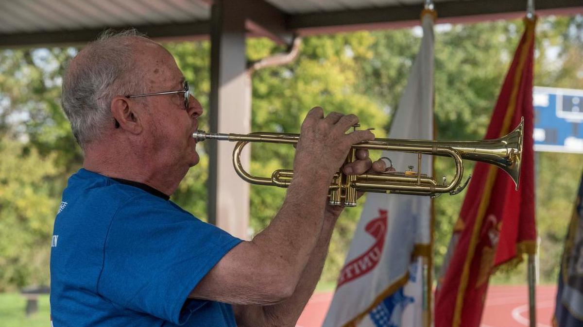 Jack Poitras plays the national anthem on the bugle, one of countless times he has, as he has played the bugle at military funerals at Jefferson Barracks National Cemetery in St. Louis for 59 years. Poitras, a Vietnam veteran, was honored during the Air Force Sergeants Association’s Vigil Run.