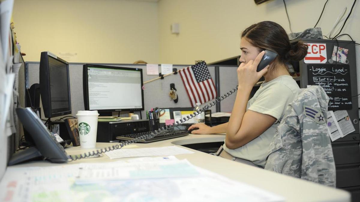 Senior Airman Corina Delgado, 355th Logistics Readiness Squadron logistics planner, responds to an incoming call at Davis-Monthan Air Force Base, Ariz. In 2016, the 355th LRS logistics planners have deployed approximately 1,000 personnel with roughly 40 percent of that within this past July, resulting in 422 personnel and 3.7 tons of cargo.