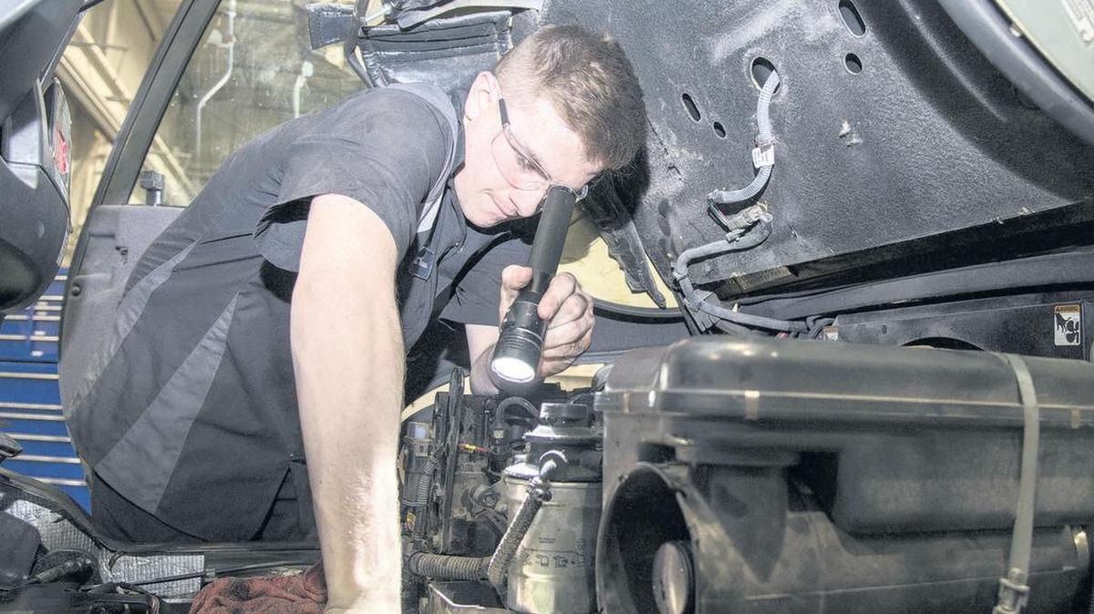 Airman 1st Class Aaron Turner, 375th Logistics Readiness Squadron vehicle maintenance technician, checks the oil on a forklift at Scott Air Force Base. As a member of vehicle maintenance, Turner is trained to inspect, repair, and maintain the 326 vehicles needed for the daily mission at Scott.