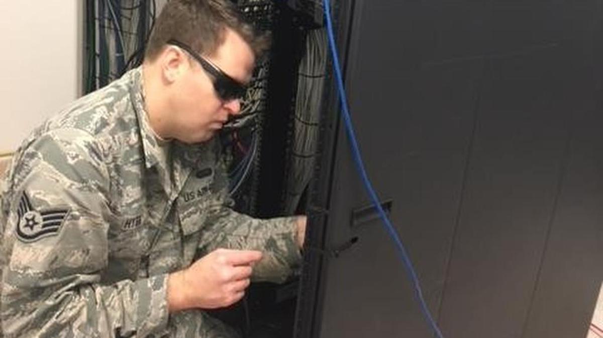An Airman conducts upgrade work on command and control systems at Naval Station Rota, Spain. Airmen assigned to U.S. Air Forces in Europe and Air Forces Africa, Air Mobility Command, Air Force Space Command, and Air Force Material command joined forces to upgrade the network.