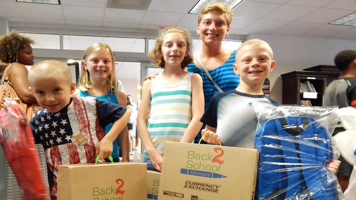 This family was among the many attendees at the Annual Back-to-School Brigade on July 22.