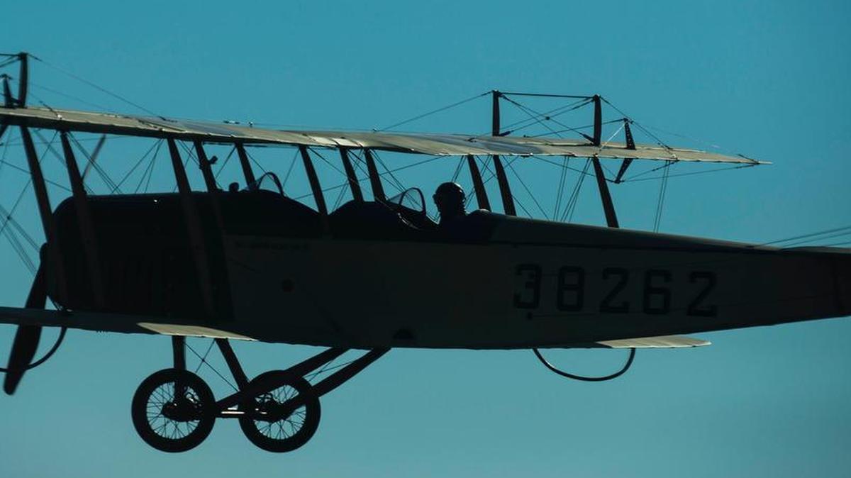 Dorian Walker, Chairman of Friends of Jenny, flies the JN-4 Jenny, at Bowling Green, Ky. The Curtiss JN-4 along with Scott Air Force Base are celebrating a century of service. The Jenny is scheduled to perform at the Scott AFB Centennial AirShow and will also be on display for spectators to view the aircraft.
