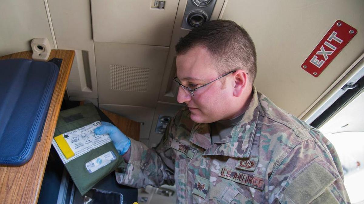 Staff Sgt. Christian Dixon, 375th Operations Support Squadron aircraft operations NCO in charge, restocks a C-21 with safety equipment Nov. 13 at Scott AFB. Aircrew Flight equipment is responsible for making sure that aircraft have all the appropriate safety equipment necessary to keep aircrew and pilots safe. Photo by Airman 1st Nathaniel Hudson
