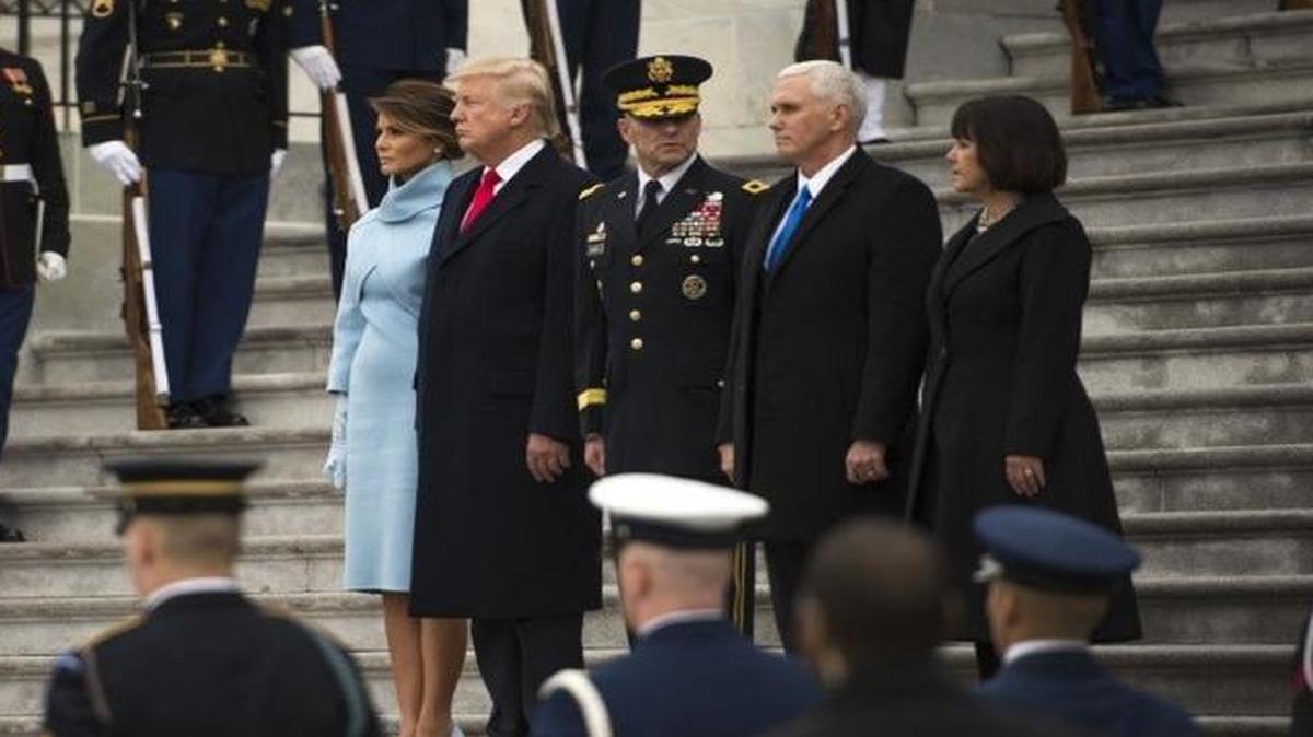 U.S Army Gen. Bradley A. Becker, Joint Task Force National Capital Region commanding general, accompanies U.S. President Donald J. Trump, U.S. Vice President Michael R. Pence, and their spouses while watching the pass in review of troops at the 58th Presidential Inauguration in Washington, D.C., Jan. 20. More than 5,000 military members from across all branches of the armed forces of the United States, including reserve and National Guard components, provided ceremonial support and Defense Support of Civil Authorities during the inaugural period.