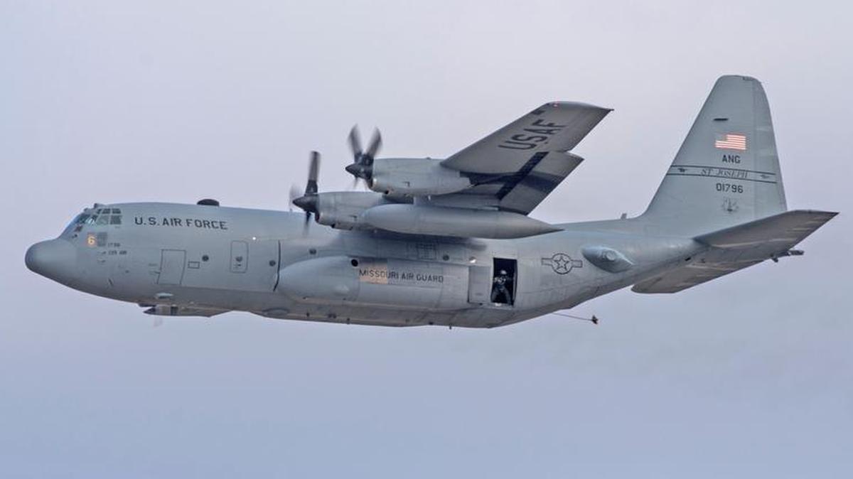 In a first for the 375th Operations Group and the next step in certifying a new Drop Zone area for use, a C-130 from the 180th Airlift Squadron, Air National Guard located in St. Joseph, Mo., performed an air drop at a drop zone space designated for dropping personnel and equipment from an aircraft Dec. 13 at Scott. The 375th Operational Support Squadron created the Drop Zone to increase the readiness of units in and around Scott and any flying or ground units with an interest and requirement. This new capability opens up a multitude of functions that the airfield can provide, making Scott a desired destination for aviators and jumpers across the U.S. and also foreign coalition partners, such as the Royal Air Force.
