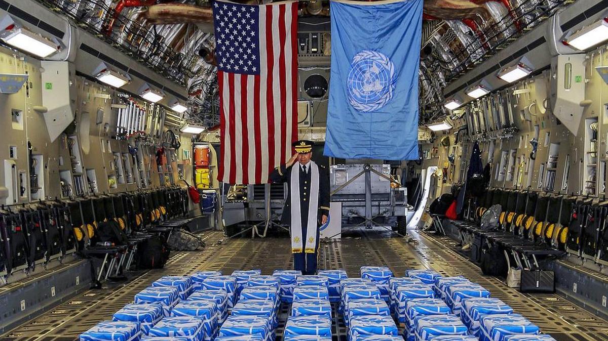 Army Col. Sam Lee, United Nations Command Chaplain, performs a blessing of sacrifice and remembrance on the 55 cases of remains returned by the Democratic People's Republic of Korea at Osan Air Base, Republic of Korea.