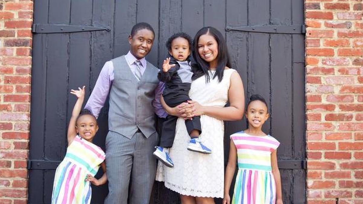 Tech. Sgt. Amber Kelly-Herard is pictured with her children.