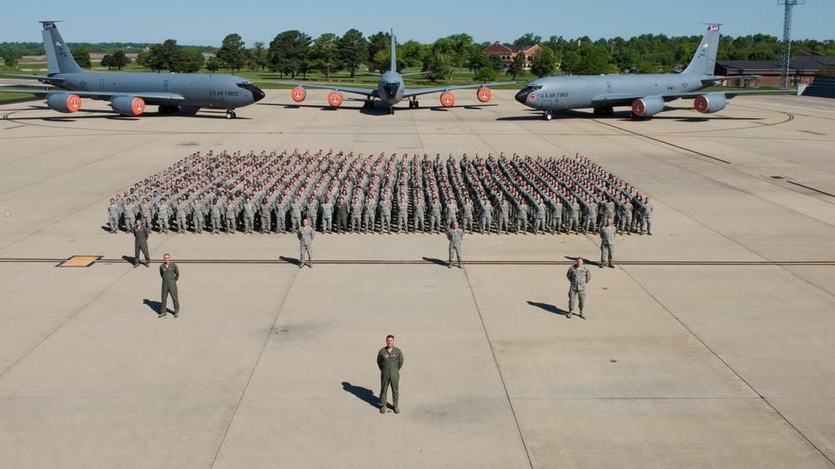 Members of the 126th Air Refueling Wing gathered on the National Guard parking ramp at Scott for a wing photo. Pictured in the front three rows are, (from left, front to back): Col. Peter Nezamis, commander; Col. Jeffrey Jacobson, vice commander; Chief Master Sgt. Michael Douglas, command chief; Col. Tom Jackson, commander, 126th Operations Group; Col. Joshua Hendrix, commander, 126th Maintenance Group; Col. Johnathan Boehning, commander, 126th Mission Support Group; and Lt. Col. Dennis Els, commander, 126th Medical Group.