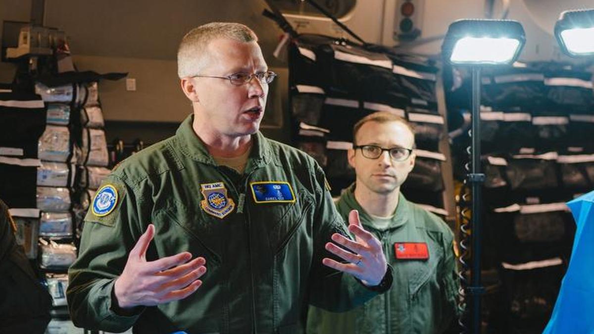 Maj. Denial Cox, Office of the Command Surgeon medical director for en route care, briefs congressional staff members on flight surgical capabilities during the 2017 Rapid Global Mobility Airpower Orientation at Joint Base Andrews, Md., March 31.