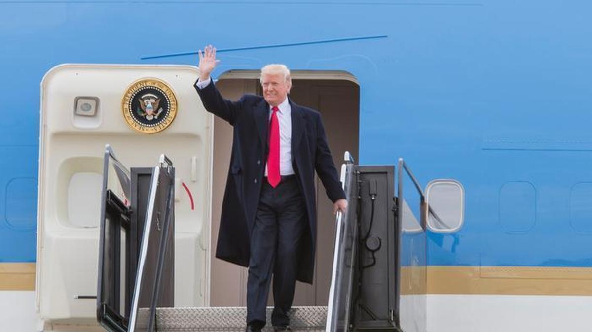 President Donald J. Trump waves to the crowd while exiting Air Force 1 at St. Louis Lambert International Airport on Nov. 29. Trump visited St. Charles, Mo., to give a speech on the newly proposed tax reform.