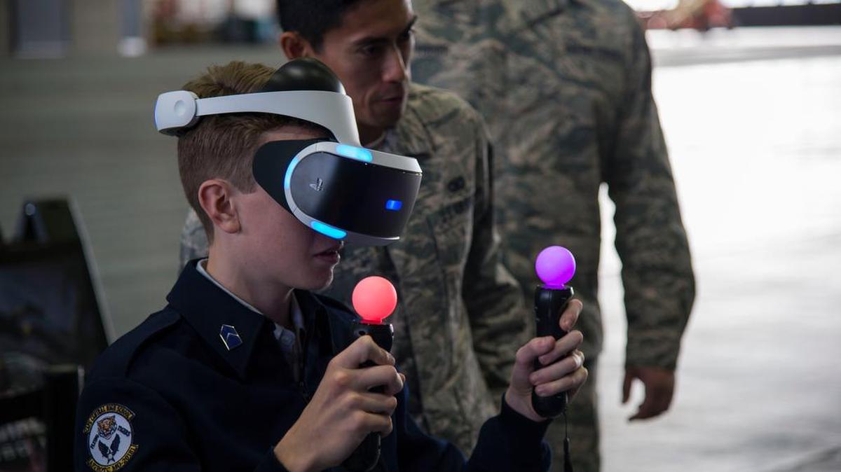 A high school Junior ROTC cadet uses virtual reality goggles provided by local recruiters at the Junior ROTC day at Scott AFB. Recruiters use virtual reality to give potential recruits a glimpse of what Air Force special operations is like. Photo by Airman 1st Class Nathaniel Hudson