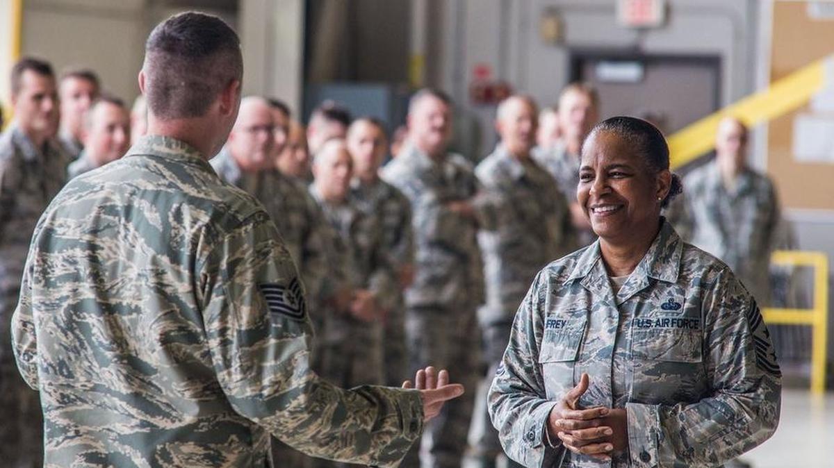 Chief Master Sgt. Shelina Frey, Air Mobility Command Command Chief, visits with Missouri Air National Guard Airmen at Rosecrans Memorial Airport.