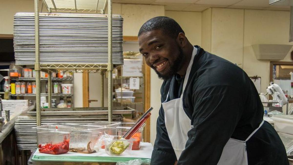 Armondo Lamar Sanders Sr., the new head chef at the Scott Event Center, prepares a meal for an event at the Scott Event Center.