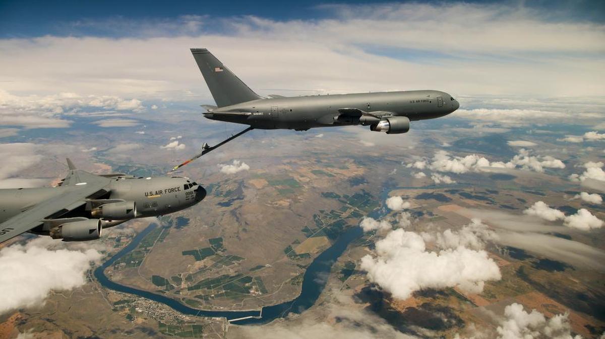 Boeing’s KC-46 aerial refueling tanker conducts receiver compatibility tests with a Air Force C-17 Globemaster III from Joint Base Lewis-McChord, Washington, as part of Test 003-06. The event marks the nearing completion of “Milestone C” in the new tanker’s developmental testing stage.